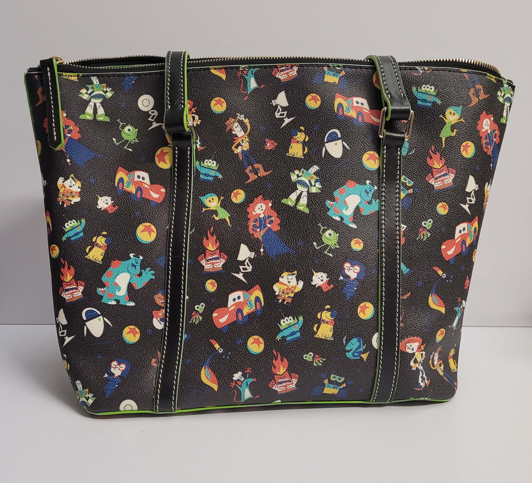 Dooney and Bourke Disney buy Pixar