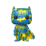Batman #02 Artist Series Funko Pop! figure out of box featuring blue and yellow graffiti artwork, Batman lettering, bat symbols, and yellow-lined cape
