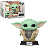 Din Grogu With Armor #712 Mandalorian Funko Pop shown in and out of the box.