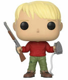 Kevin #491 Home Alone Funko Pop figure out of box holding BB gun and iron