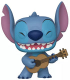 Stitch with Ukulele Funko Pop #1044 standing out of box, grinning while playing a small brown ukulele.
