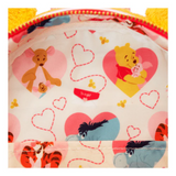 Inside liner of Loungefly Winnie the Pooh Love Letter Mini-Backpack with themed pattern